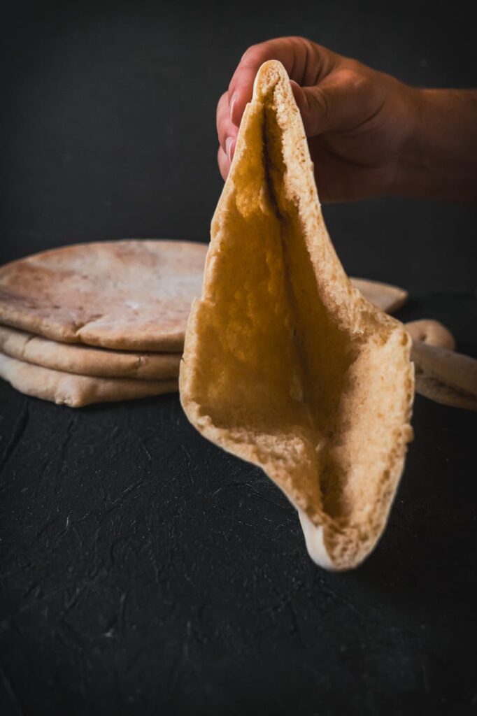 Pita bread recipe showing open pita pocket
