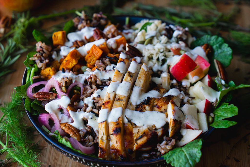 fall harvest salad drizzled with rosemary ranch